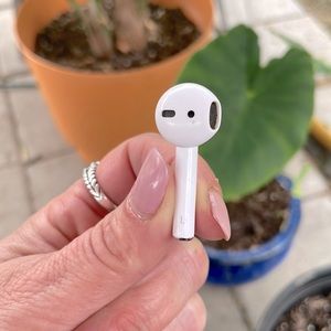 Left Apple AirPod (1st Generation)
